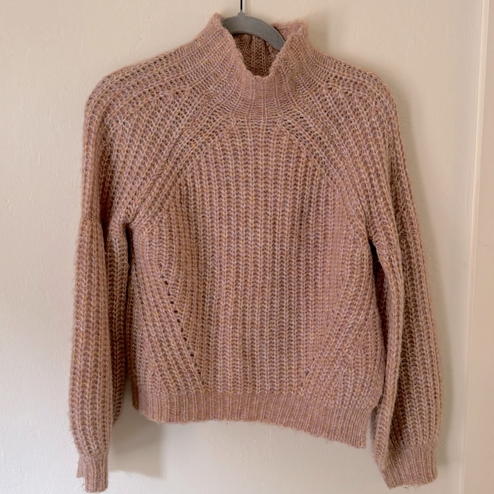 Pink turtleneck sweater